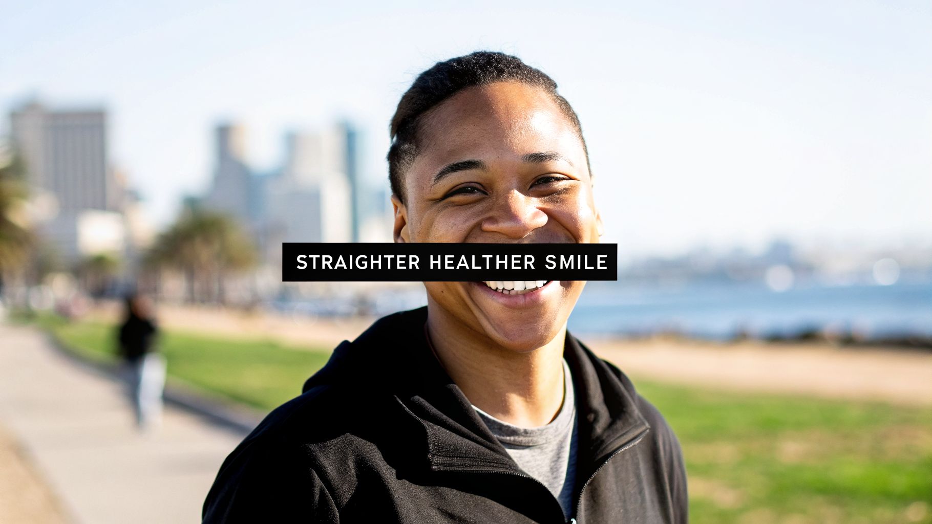 A smiling person with a black bar covering their mouth, text reads 'STRAIGHTER HEALTHIER SMILE', with a city and ocean backdrop.